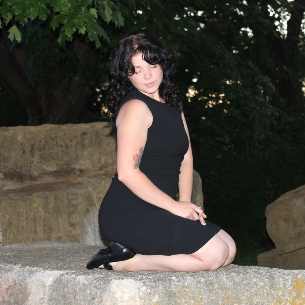 Black business casual sleeveless dress.